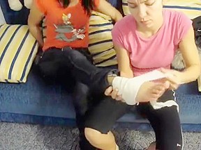2 Girls with 3 Injured Feet Wrapped in Bandage and Wearing Flats – FreePron.Org