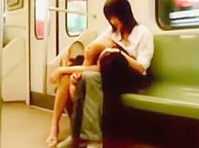 Asian lesbian couple make out in metro – FreePron.Org