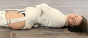 Girl trapped in straitjacket, bound legs. – FreePron.Org